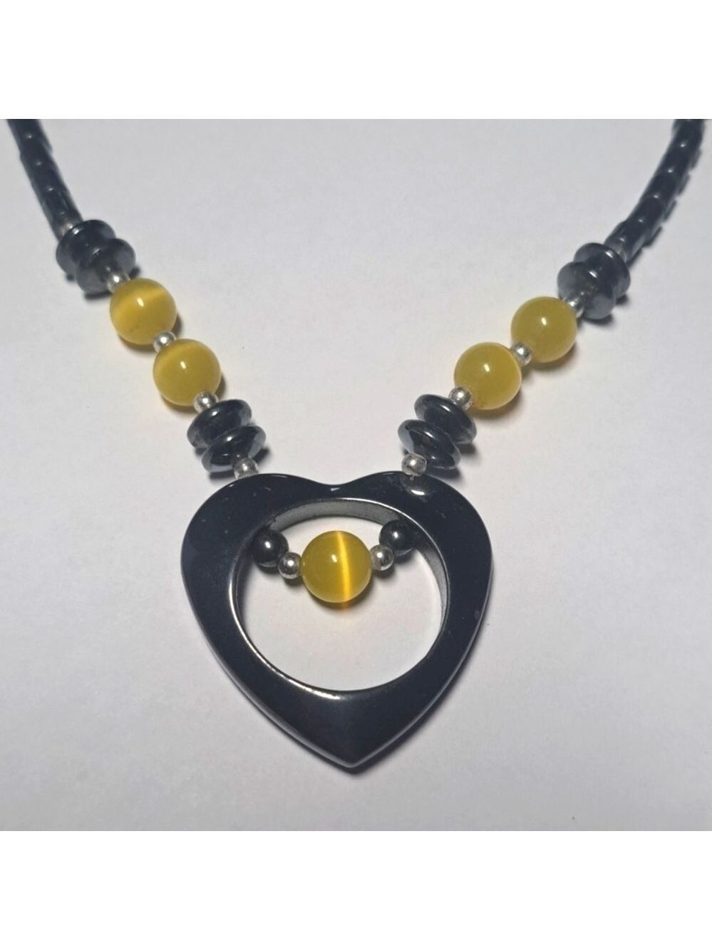 Hematite Heart Pendant Necklace with Yellow Cats Eye Beads